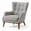 Sillón de lino gris con patas de madera